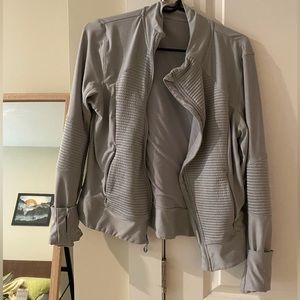Asymmetrical zip athletic jacket. Unknown brand
